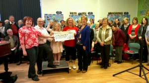 Sing! Bentley Heath present a cheque to the Brain Tumour Trust