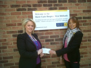 Sing! Bentley Heath present a cheque to Marie Curie Cancer Care